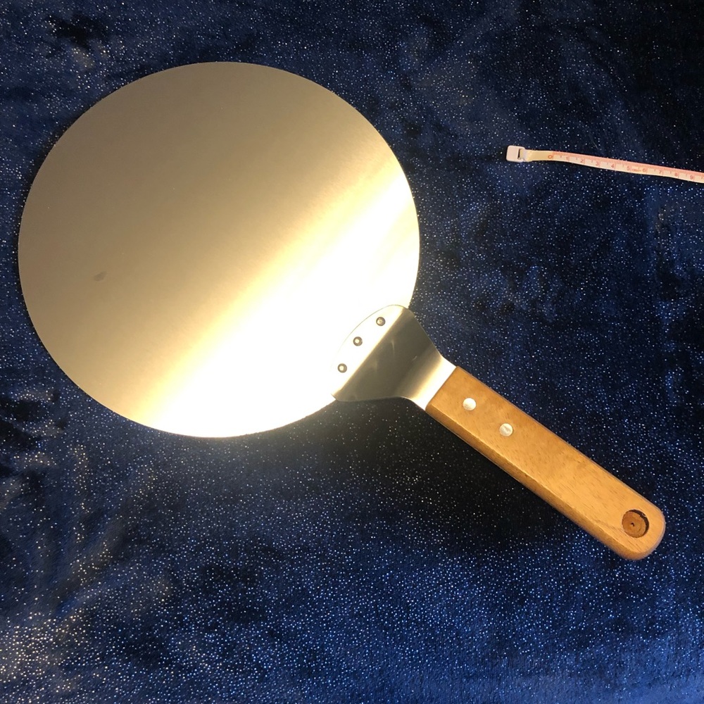 Pizza Server 10 inch circular never been used. - Picture 4 of 7